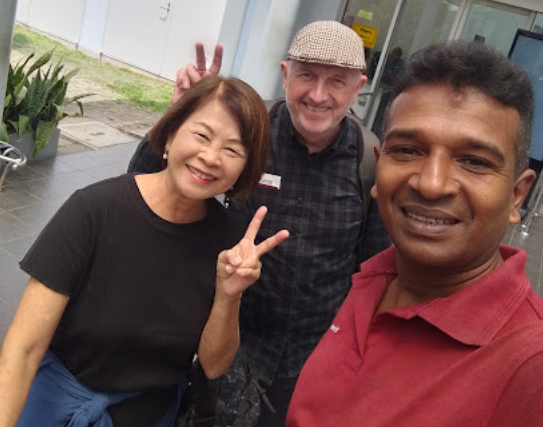 Priyantha with travellers